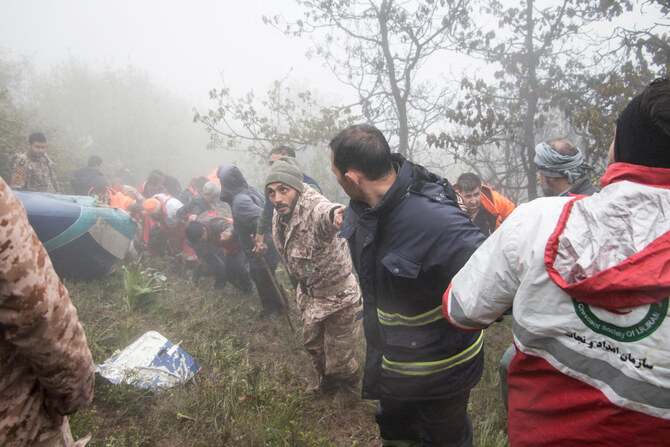 Rescue team works following a crash of a helicopter carrying Iran's President Ebrahim Raisi, in Varzaqan.