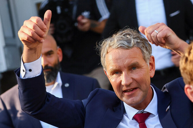 Right-wing Alternative for Germany (AfD) top candidate Bjoern Hoecke gives thumbs up on the day of the Thuringia state election 