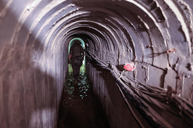 An Israeli soldier is seen inside a tunnel that the army claimed is a “Hamas command tunnel” in Gaza City. (File/AFP)