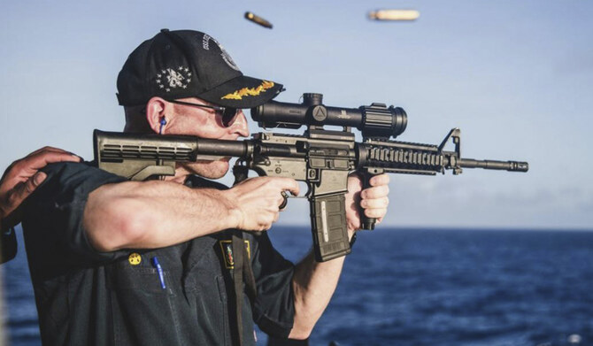 Commander of Navy warship relieved of duty months after backward rifle scope photo flap