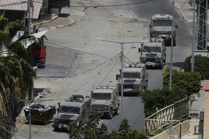 Israeli military vehicles maneuver during an operation in the West Bank city of Jenin, Thursday, Sept. 5, 2024. (AP)