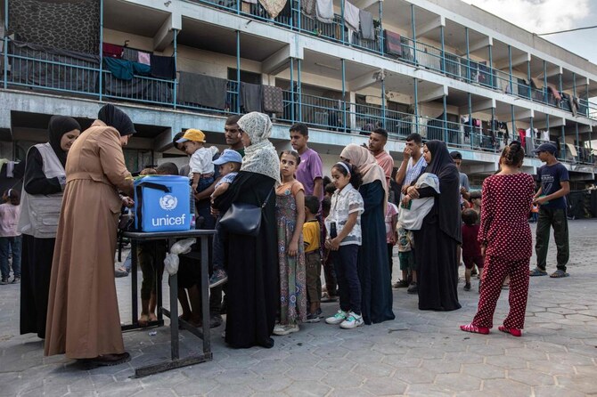 CORRECTED: Gazans rush to vaccinate children as new polio drive launches