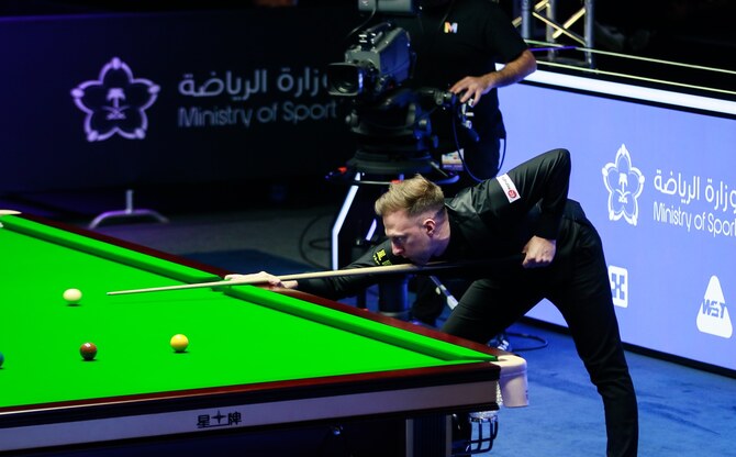 Top seed Judd Trump through to semifinals of Saudi Arabia Snooker Masters as Ronnie O’Sullivan exits after loss to Si Jiahui