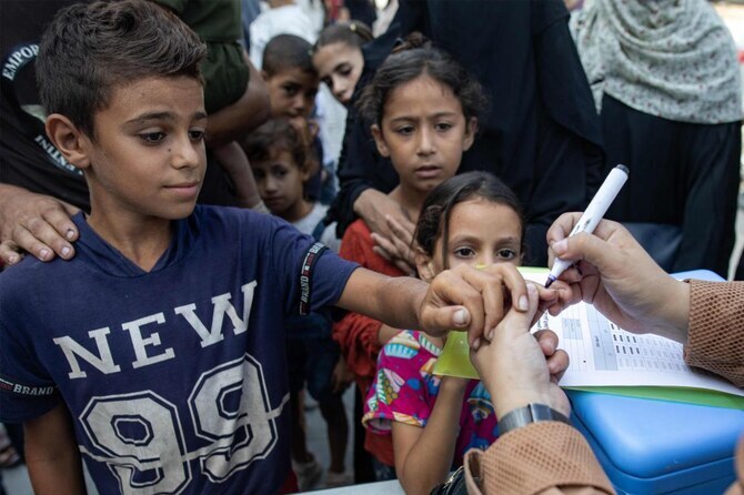 Israeli strikes kill 12 Palestinians in Gaza as polio vaccination resumes