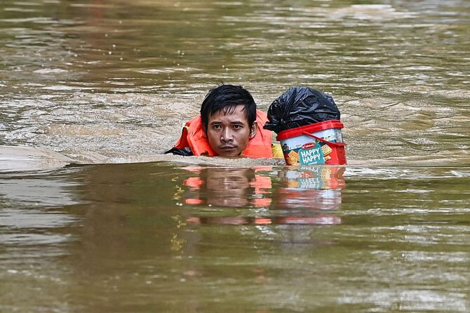 Floods inundate north Vietnam as Typhoon Yagi death toll climbs