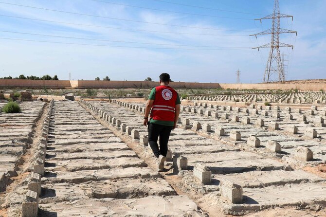 A Libyan city scarred by disaster tries to rebuild a year after deadly flooding