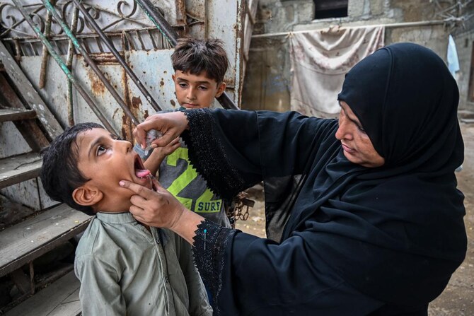 Gunmen kill a polio worker during a vaccination campaign in Pakistan