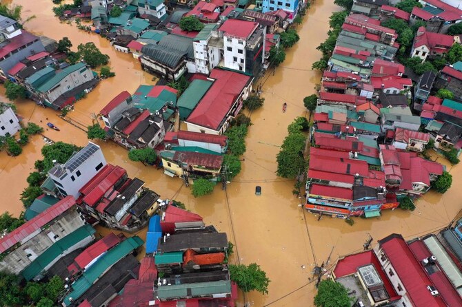 Vietnam death toll climbs to 197 as typhoon’s aftermath brings flash floods and landslides