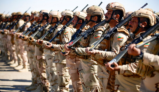 Iraqi soldiers from the new 'desert battalion' special forces take part in a graduation ceremony in Anbar west of Baghdad. (AFP)