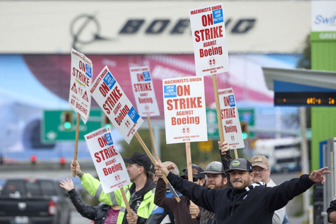 Striking Boeing factory workers say they are ready to hold out for a better contract