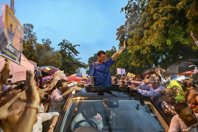 Arvind Kejriwal, Chief Minister of Delhi, greets his supporters after Supreme Court granted him bail in New Delhi.