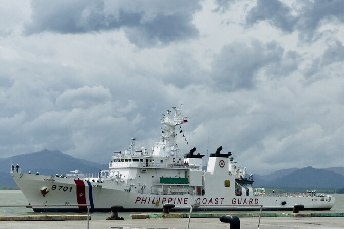 Philippines vows to maintain presence in contested South China Sea shoal