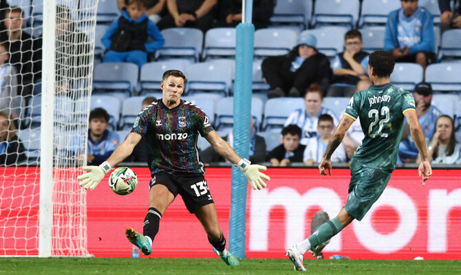 Tottenham mounts late comeback to beat Coventry 2-1 in the English League Cup