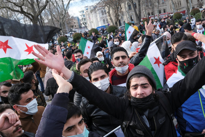 Syrians living in Turkey demonstrate in Istanbul on March 13, 2021 to mark the upcoming 10th anniversary of Syrian conflict. (REUTERS/Murad Sezer)