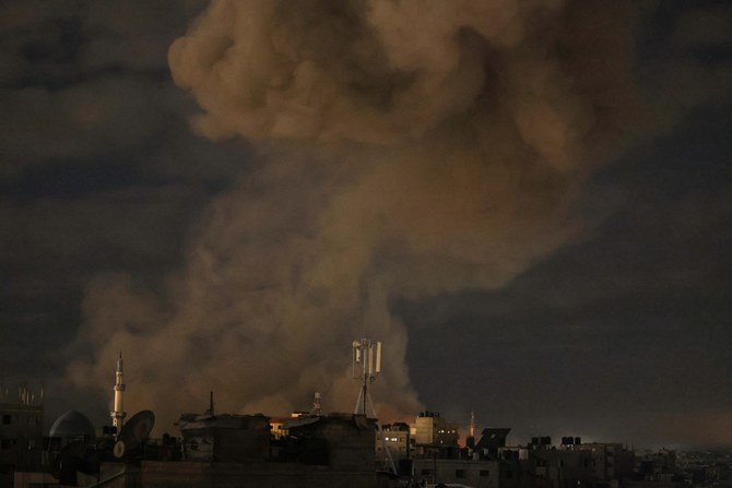Smoke billows in the sky following Israeli bombardment in Rafah refugee camp. Feb. 22, 2024 (File/AFP)