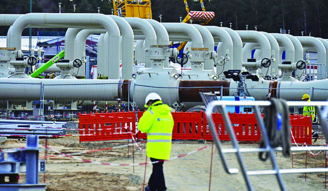 A worker walks at the construction site of the so-called Nord Stream 2 gas pipeline in Lubmin, northeastern Germany. (AFP)