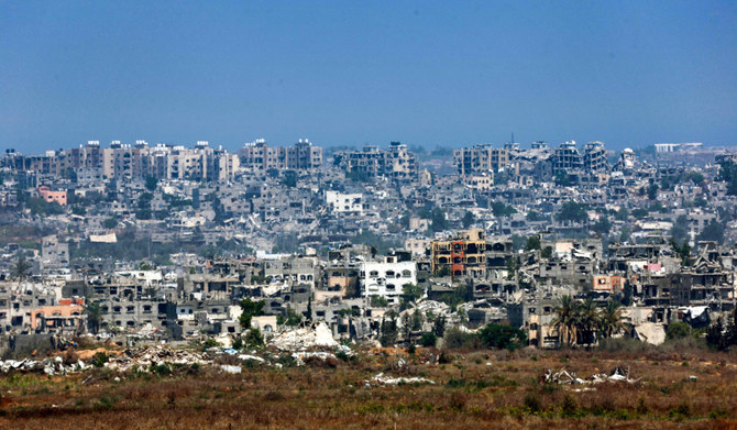 Buildings destroyed during Israeli bombardment in the Palestinian territory on July 9, 2024. (AFP)