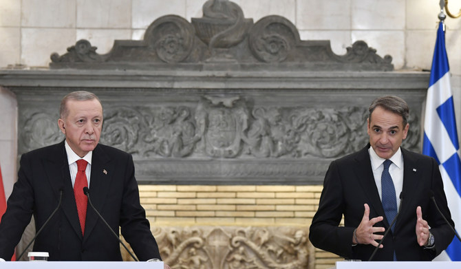 Greece's PM Kyriakos Mitsotakis with Turkey's Erdogan after their meeting at Maximos Mansion in Athens, Greece. (AP)