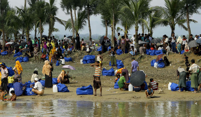 Displaced Rohingya refugees from Rakhine state in Myanmar rest near Ukhia, at the border between Bangladesh and Myanmar. (AFP)