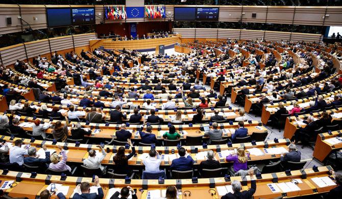 Members of the European parliament vote during a plenary mini-session at the European Parliament in Brussels. (AFP)