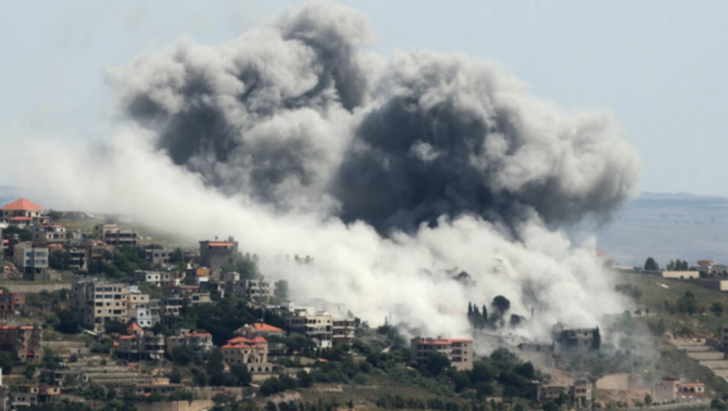 Smoke billows over the southern Lebanese village of Khiam after an Israeli strike. (AFP/File Photo)