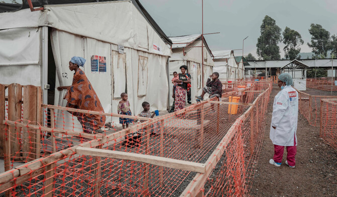 Patients stand in the red zone at the Mpox treatment centre north of Goma on August 17, 2024. (AFP)