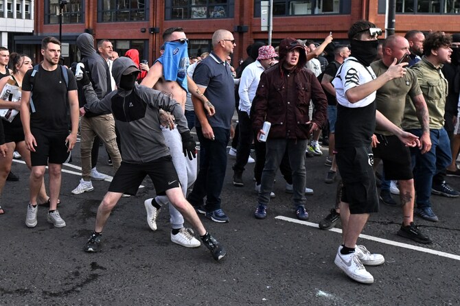 For several days, violent riots broke out in about 20 towns and cities across the UK. They were the worst riots since 2011 (AFP)