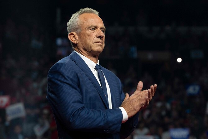 Former Republican presidential candidate Robert F. Kennedy Jr. listens during a campaign rally. (AFP)