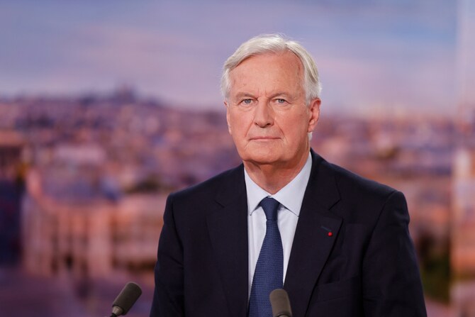 France's newly appointed Prime Minister, Michel Barnier poses during an evening news broadcast (File/AFP)