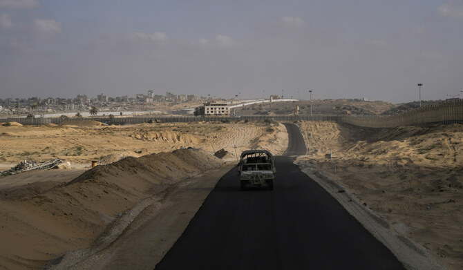 Israeli soldiers move along the Philadelphi Corridor along the border with Egypt, in Gaza on Friday, Sept. 13, 2024. (AP)