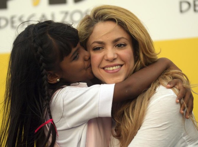 Shakira opens charity school in Colombia shanty