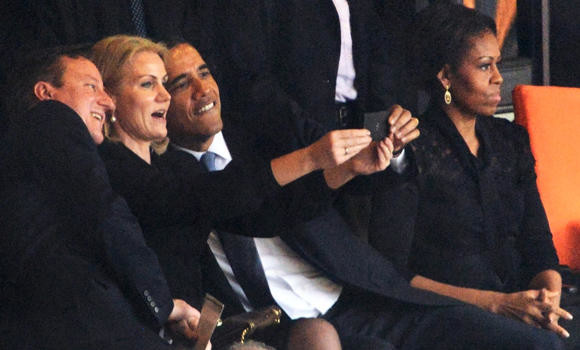 British PM laughs off ‘selfie’ at Mandela memorial