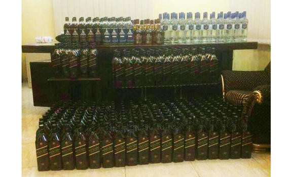 336 bottles of alcohol seized, 3 arrested