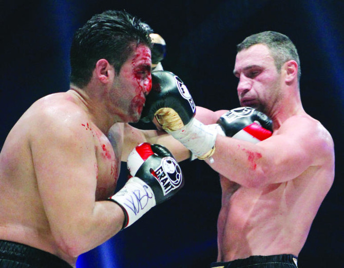 Klitschko stops Charr in 4th, keeps title